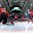 ZUG, SWITZERLAND - APRIL 25: Switzerland's Joren van Pottelberghe #30 can't make the save on this play giving Finland a 3-2 lead as Jonas Siegenthaler #24, Livio Stadler #4 and Calvin Thurkauf #18 look on during semifinal round action at the 2015 IIHF Ice Hockey U18 World Championship. (Photo by Matt Zambonin/HHOF-IIHF Images)


